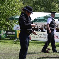 police woman learning to diablio at devilstick peat circus skills workshop